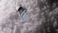 Vials labelled "COVID-19 Coronavirus Vaccine" are placed on dry ice in this illustration taken, December 4, 2020. Picture taken December 4, 2020. REUTERS/Dado Ruvic/Illustration