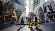 People wearing face masks as a precaution against the spread of the coronavirus seen walking along a Pavilion shopping mall during the second day of the Hari Raya celebrations.Malaysia's Prime Minister Muhyiddin Yassin, has announced the whole of Malaysia is placed under the Movement Control Order (MCO) from May 12 to June 7, 2021, due to the rising of Covid-19 infections. (Photo by Wong Fok Loy / SOPA Images/Sipa USA)No Use Germany.